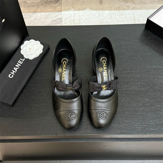 Chanel Mary Jane flats with a bow