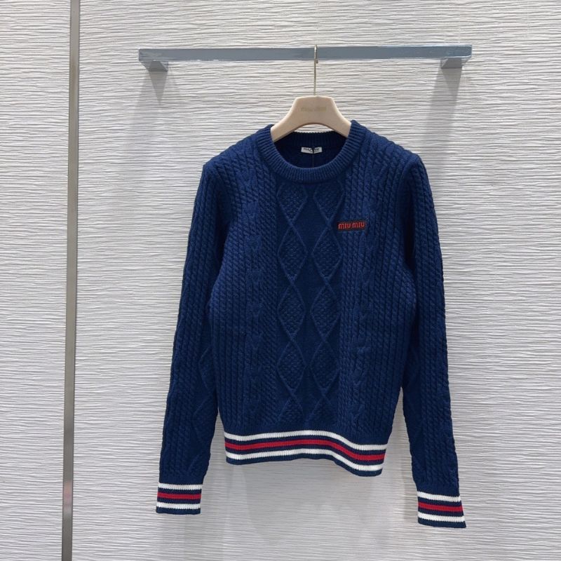 Miu Miu navy blue cable-knit sweater.