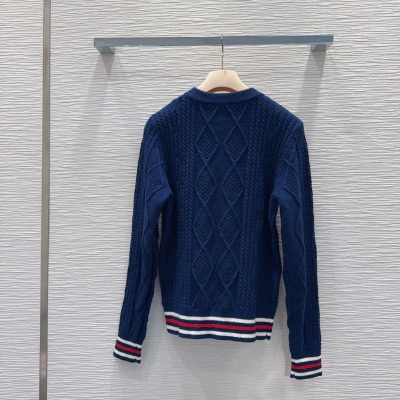 Miu Miu navy blue cable-knit sweater.