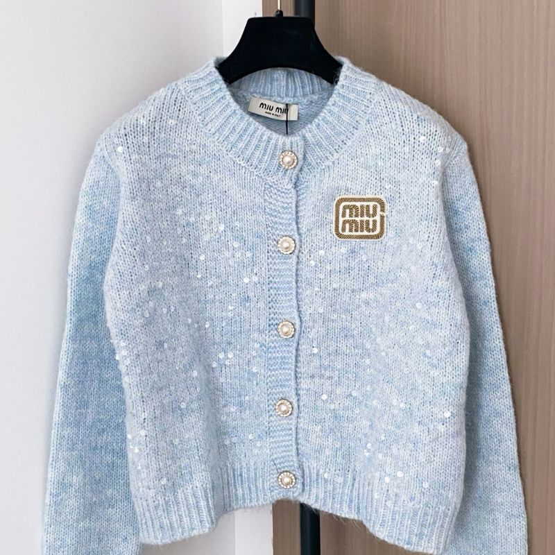 Miu Miu light blue cardigan.