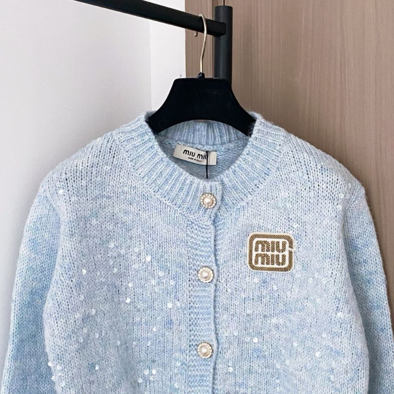 Miu Miu light blue cardigan.