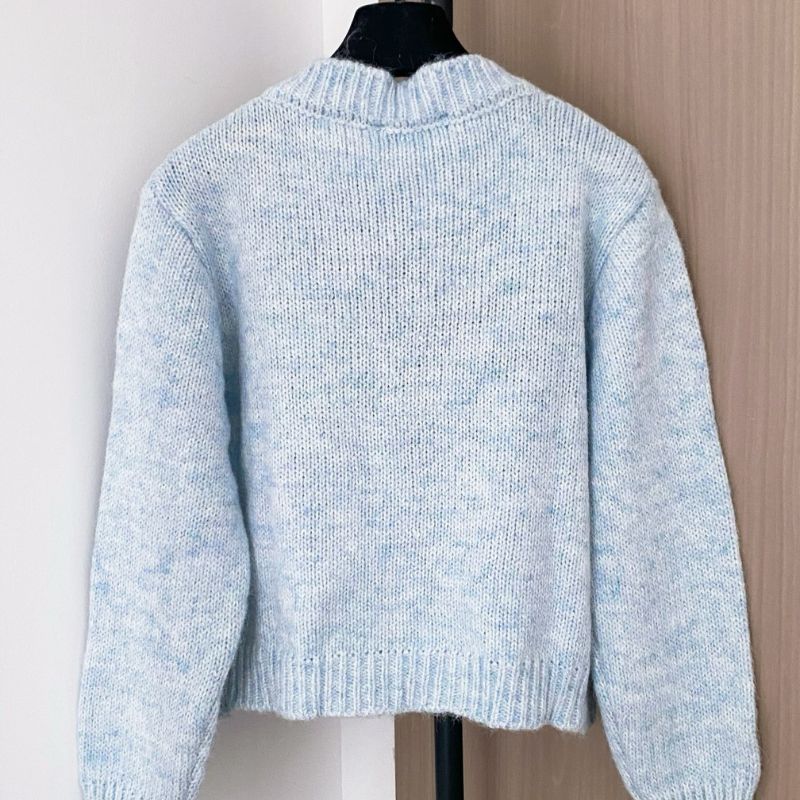 Miu Miu light blue cardigan.