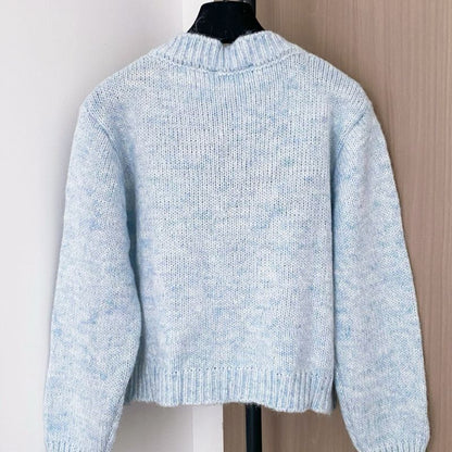 Miu Miu light blue cardigan.