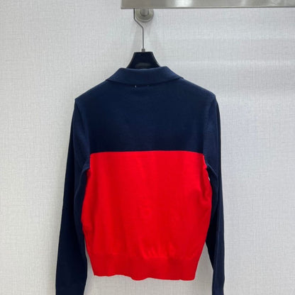 Miu Miu half-zip knit polo sweater.