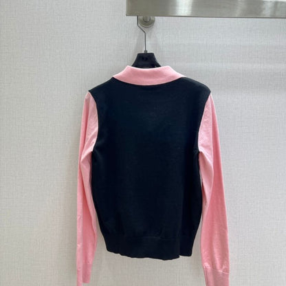 Miu Miu layered knit sweater.