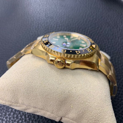 Rolex GMT-Master II Yellow Gold Green Dial