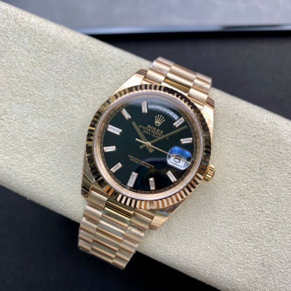 Rolex Day-Date 40 Yellow Gold Black Baguette Dial