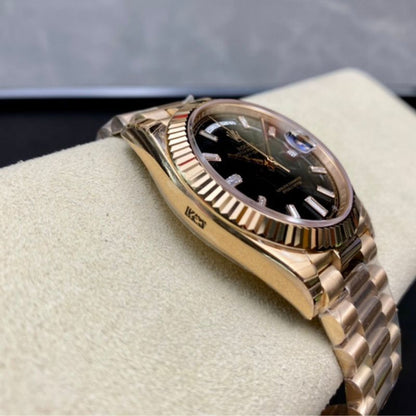 Rolex Day-Date 40 Yellow Gold Black Baguette Dial