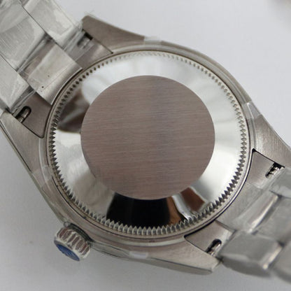 Rolex Oyster Perpetual Green Dial Watch