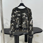 Chanel Black Sweater With White and Gold Floral Design