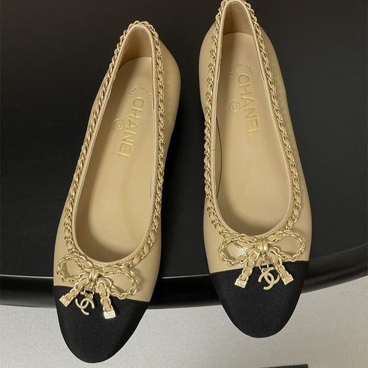 Chanel Cap-Toe Ballerinas with Gold Chain Detail