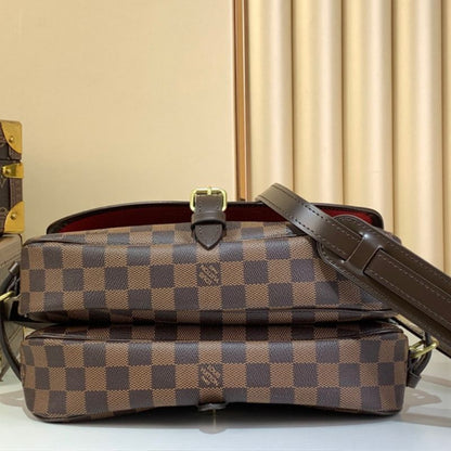 Louis Vuitton Saumur handbag in the Damier Ebene canvas
