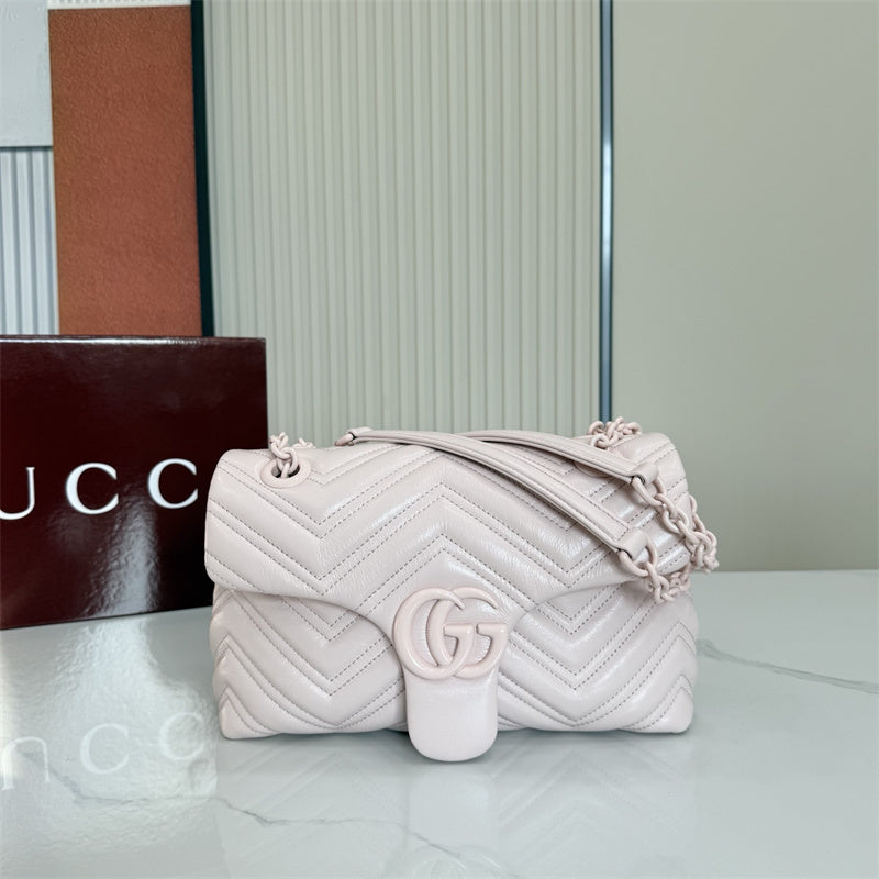Gucci GG Marmont Small Matelassé Shoulder Bag in a light pink hue.
