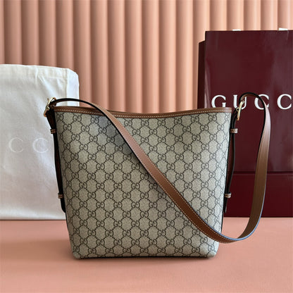 Gucci GG Emblem small bucket bag.