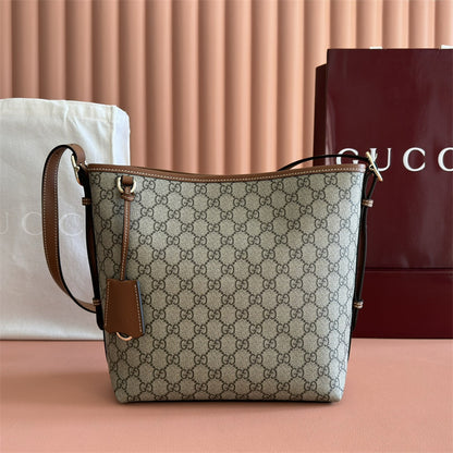 Gucci GG Emblem small bucket bag.