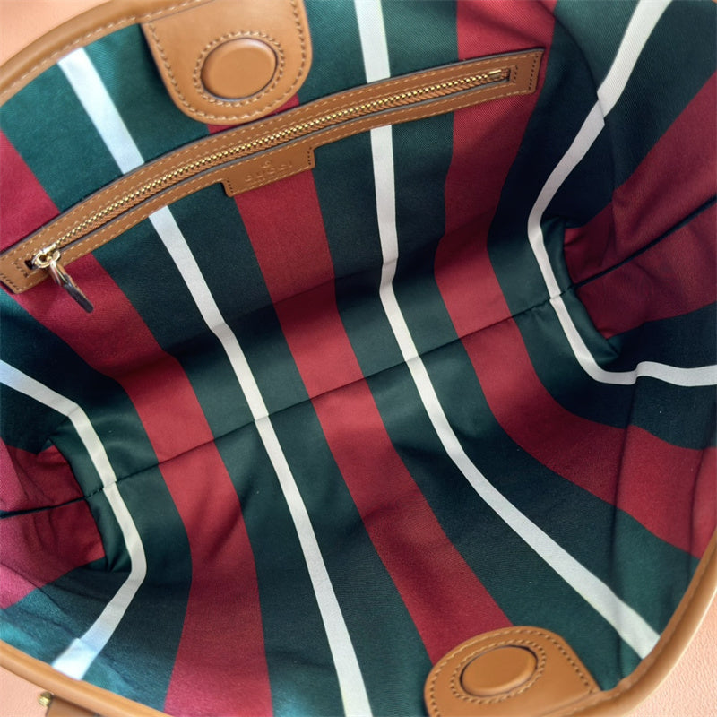 Gucci GG Emblem small bucket bag.