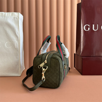 Gucci Mini green GG suede handbag