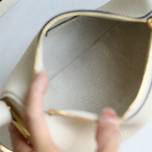 Gucci Half Horsebit Mini Bag in a light ivory or cream shade.