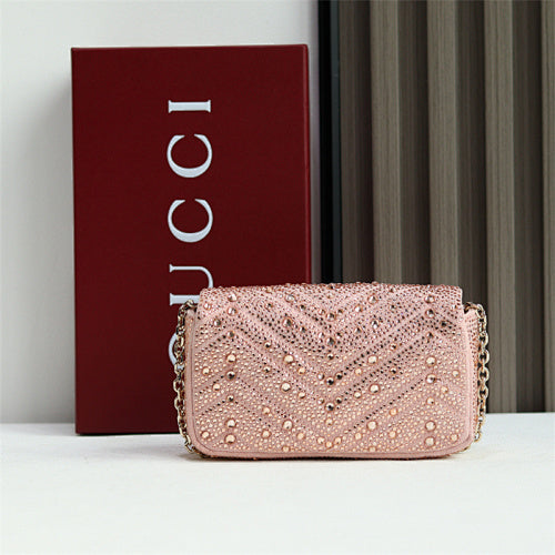 Gucci GG Marmont Crystal Small Shoulder Bag in pink matelassé leather.