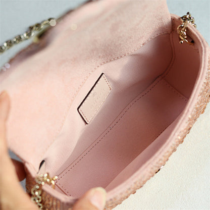 Gucci GG Marmont Crystal Small Shoulder Bag in pink matelassé leather.