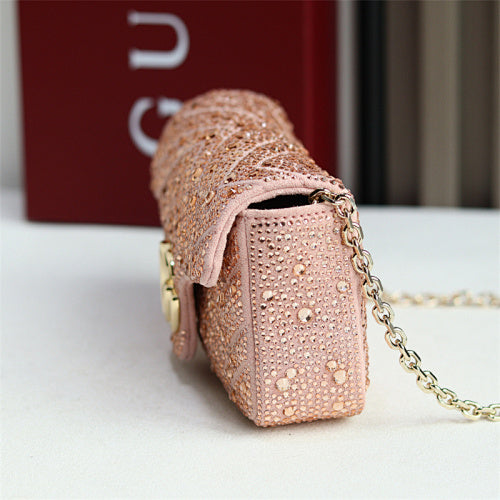 Gucci GG Marmont Crystal Small Shoulder Bag in pink matelassé leather.