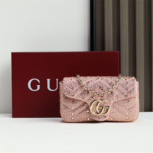 Gucci GG Marmont Crystal Small Shoulder Bag in pink matelassé leather.